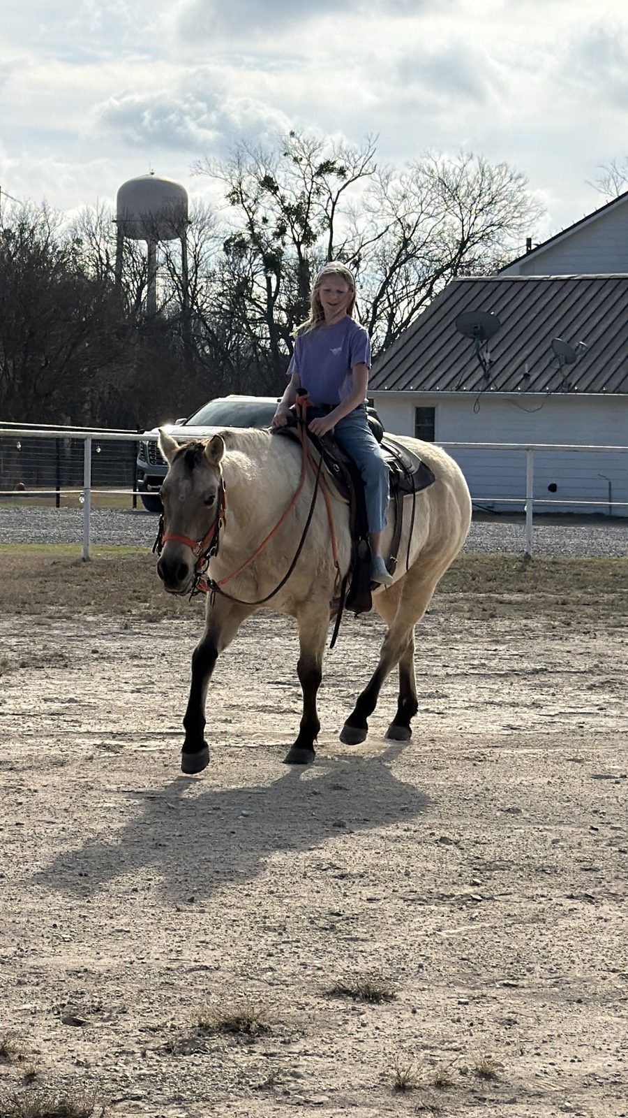 Horseback riding in the arena at Rigid Ranch