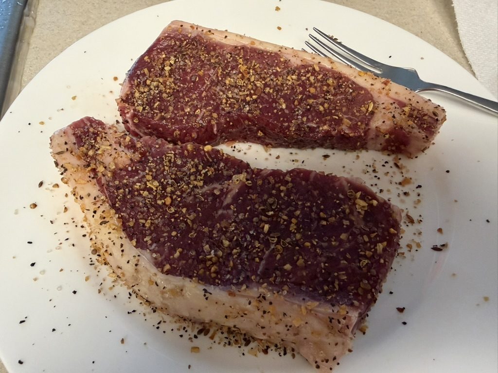 Rigid Ranch strip steaks on the plate